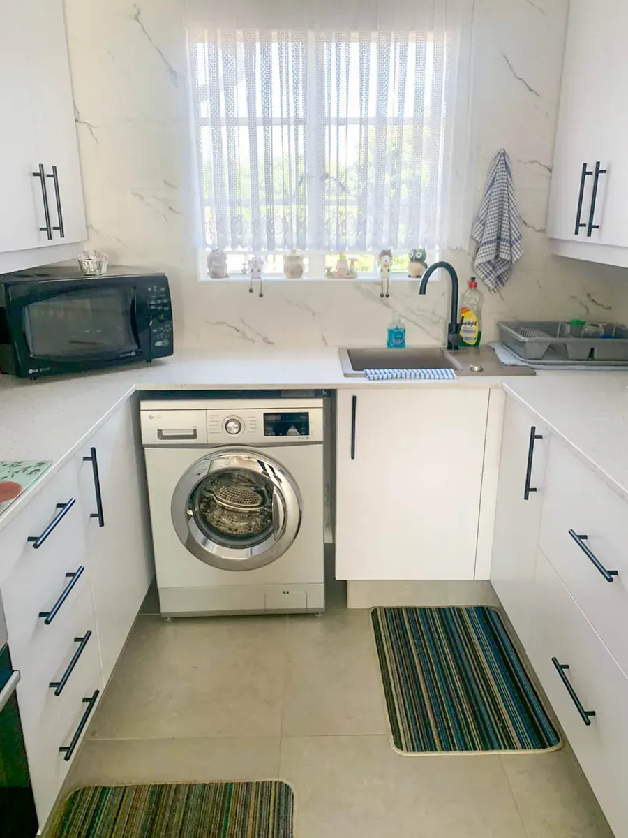 Compact laundry and kitchen area – Brackenhurst, Alberton